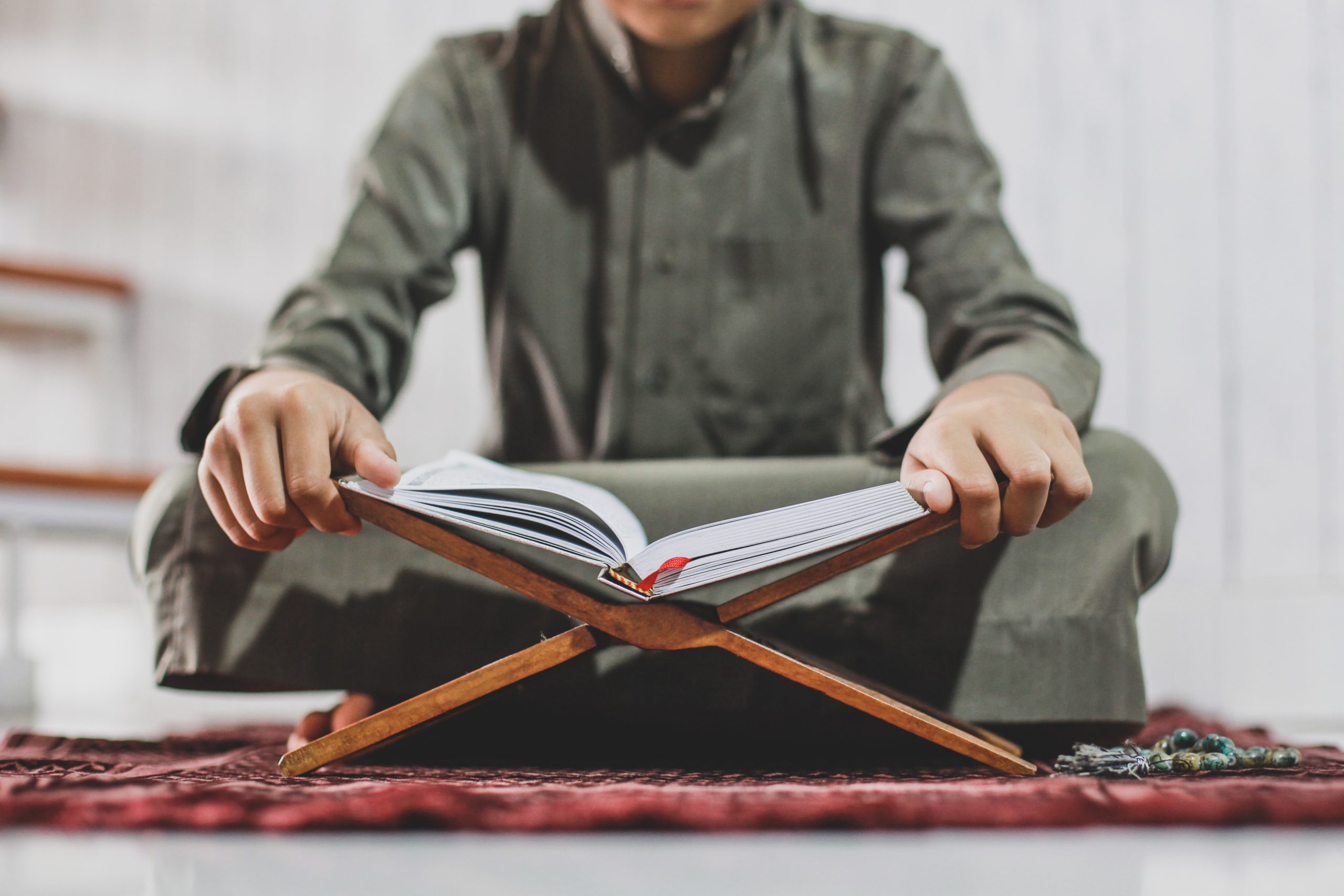 muslim-man-reading-holy-quran-2021-08-30-07-25-37-utc